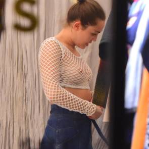 Miley Cyrus no bra in shopping