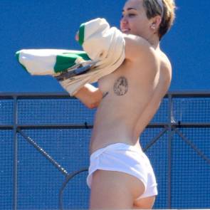 Miley Cyrus showing side boob