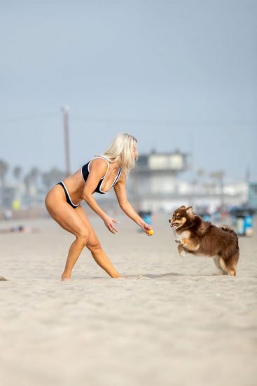 Lana WWE playing with dog