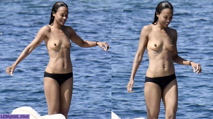 Zoe Saldana shows off her boobs on the beach