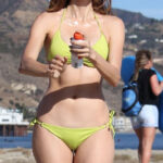 Blanca Blanco showing cameltoe in a bikini on the beach